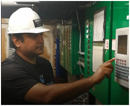 Singh360 field technician checking a refrigeration controller